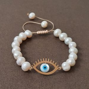 دستبند طلا 18 عیار زنانه الماسین آذر طرح چشم نظر مدل cheshsadaf02