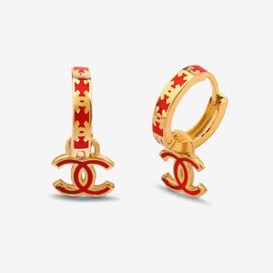 گوشواره حلقه‌ای طلا کم اجرت 18 عیار زنانه با طرح شنل گلدم مدلشنل قرمز e244026