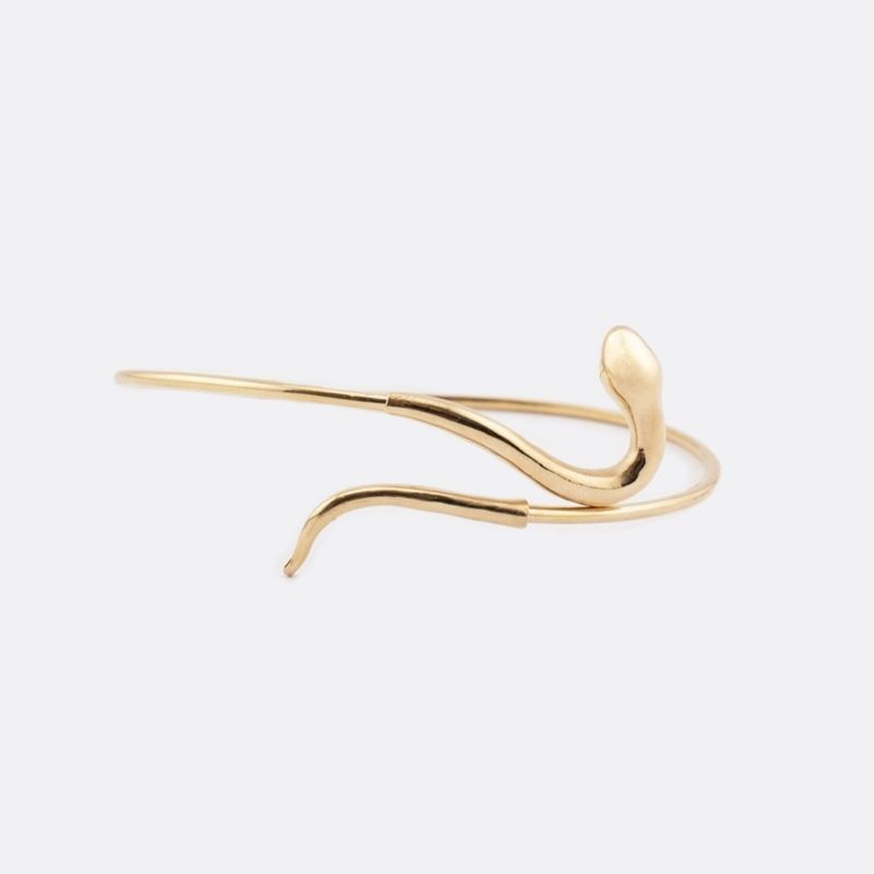 دستبند طلا کم اجرت 18 عیار زنانه طلا و شمش برلیان مدل بنگل طرح مار
