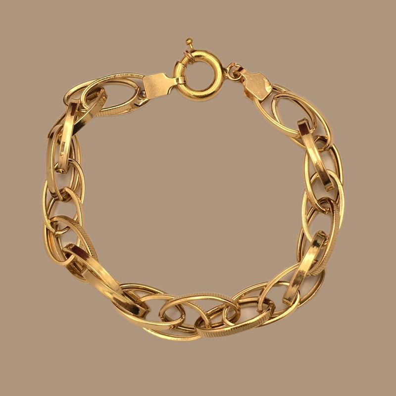 دستبند طلا کم اجرت 18 عیار زنانه گالری طلا و شمش برلیان مدل زنجیری حلقه ای کد 03